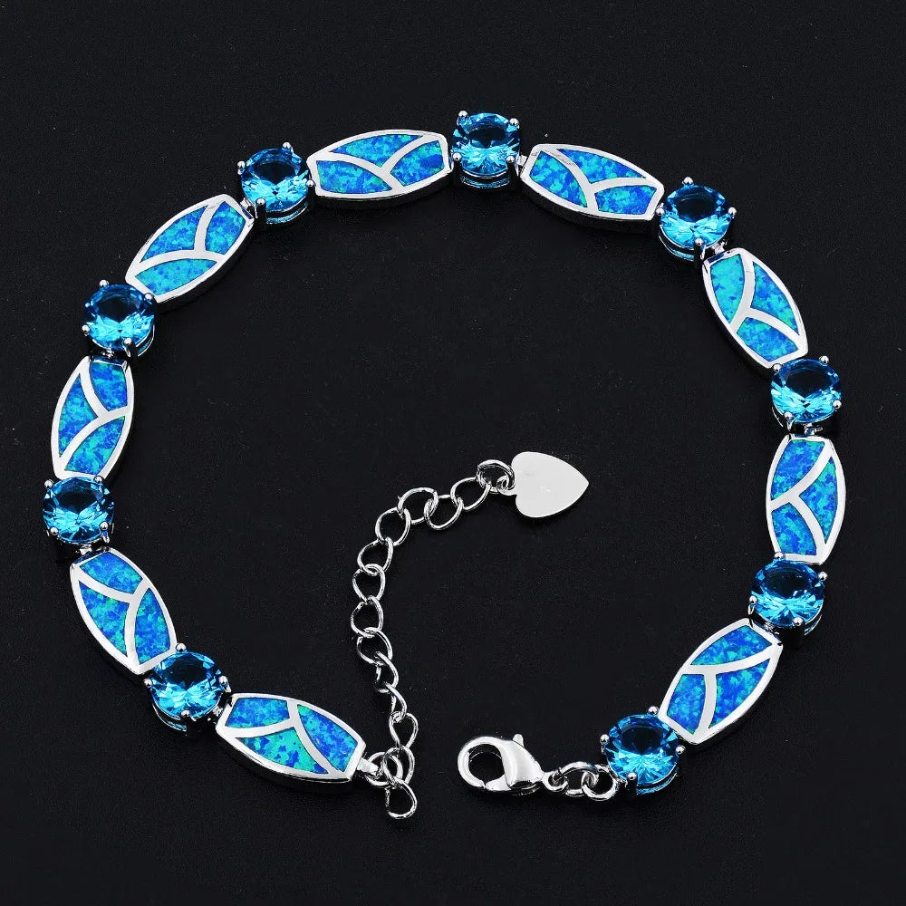 Blue beaded bracelet on a black background