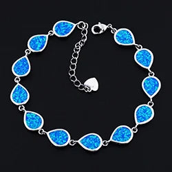 Blue teardrop-shaped bracelet on a black background