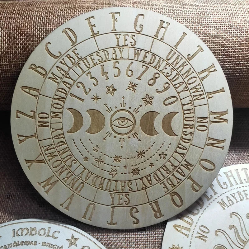 Decorative circular object with symbols and text on a textured fabric background