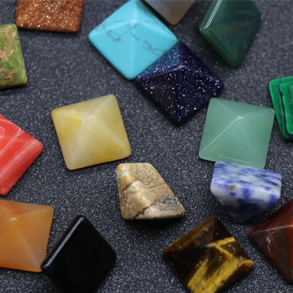 Assorted colorful stones on a dark surface