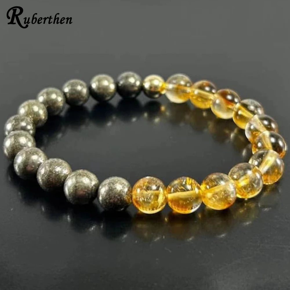 Bracelet with yellow and silver beads on a dark background