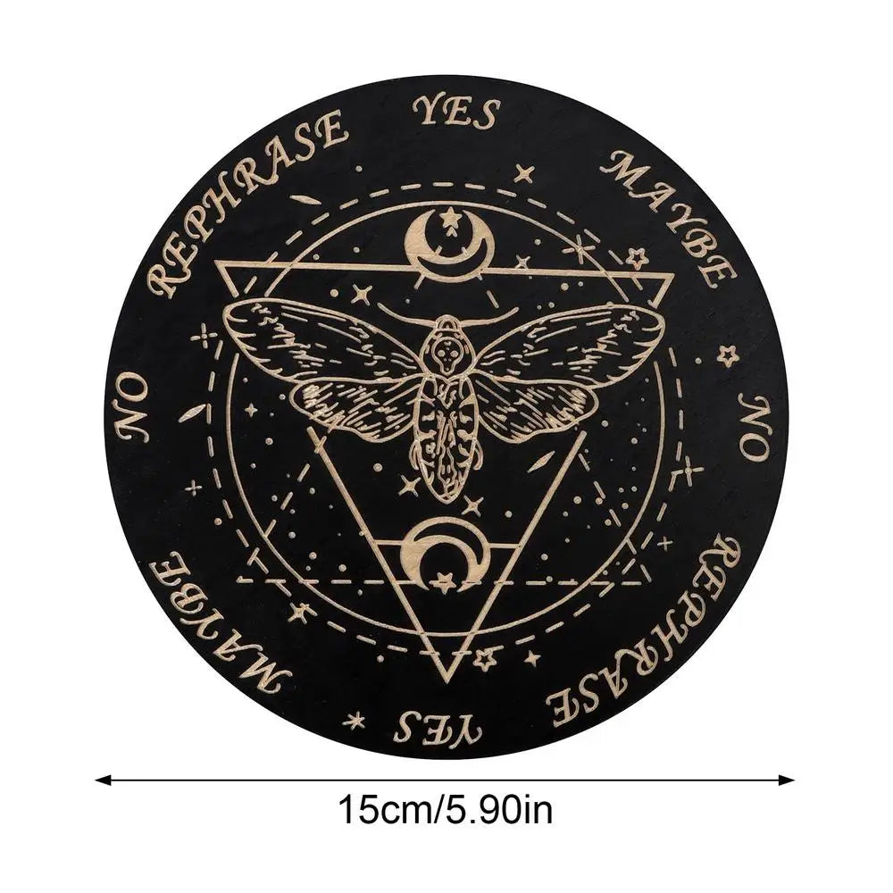 Black circular coaster with white symbols and text, featuring a moth design, on a white background.
