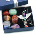 Set of chakra stones and a chakra pendant in a blue box