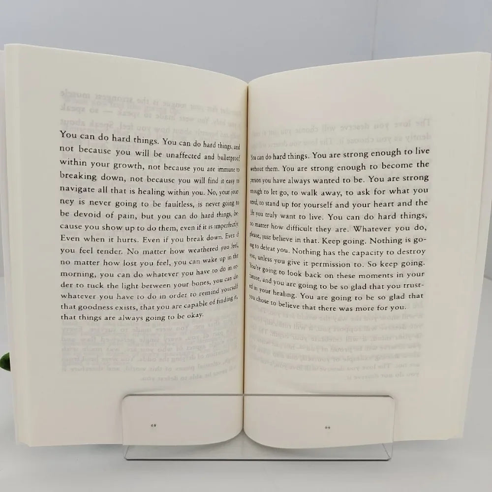 Open book with text on a white background