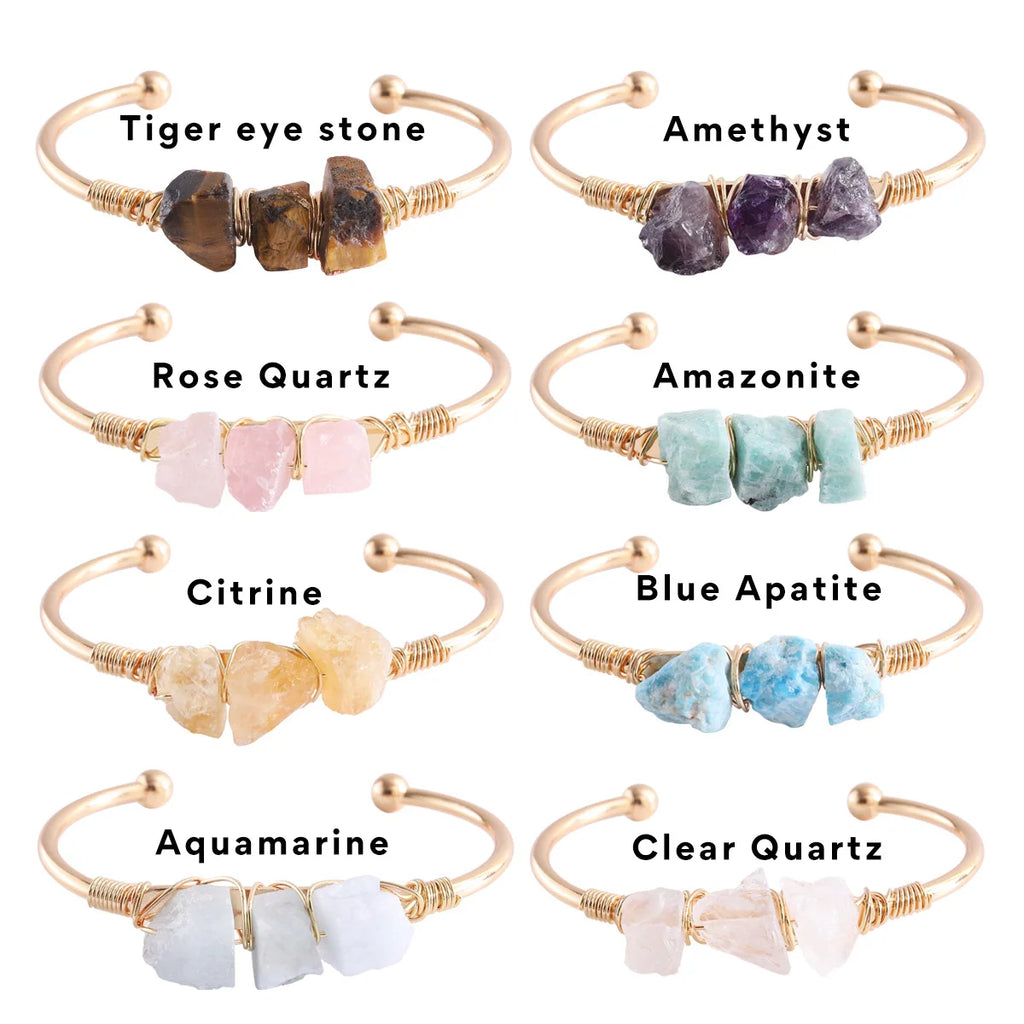 Set of gemstone bracelets with labels on a white background