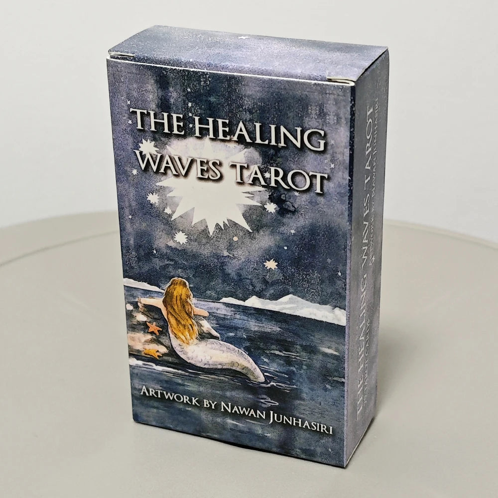 Box of 'The Healing Waves Tarot' with a mermaid illustration on a gray background