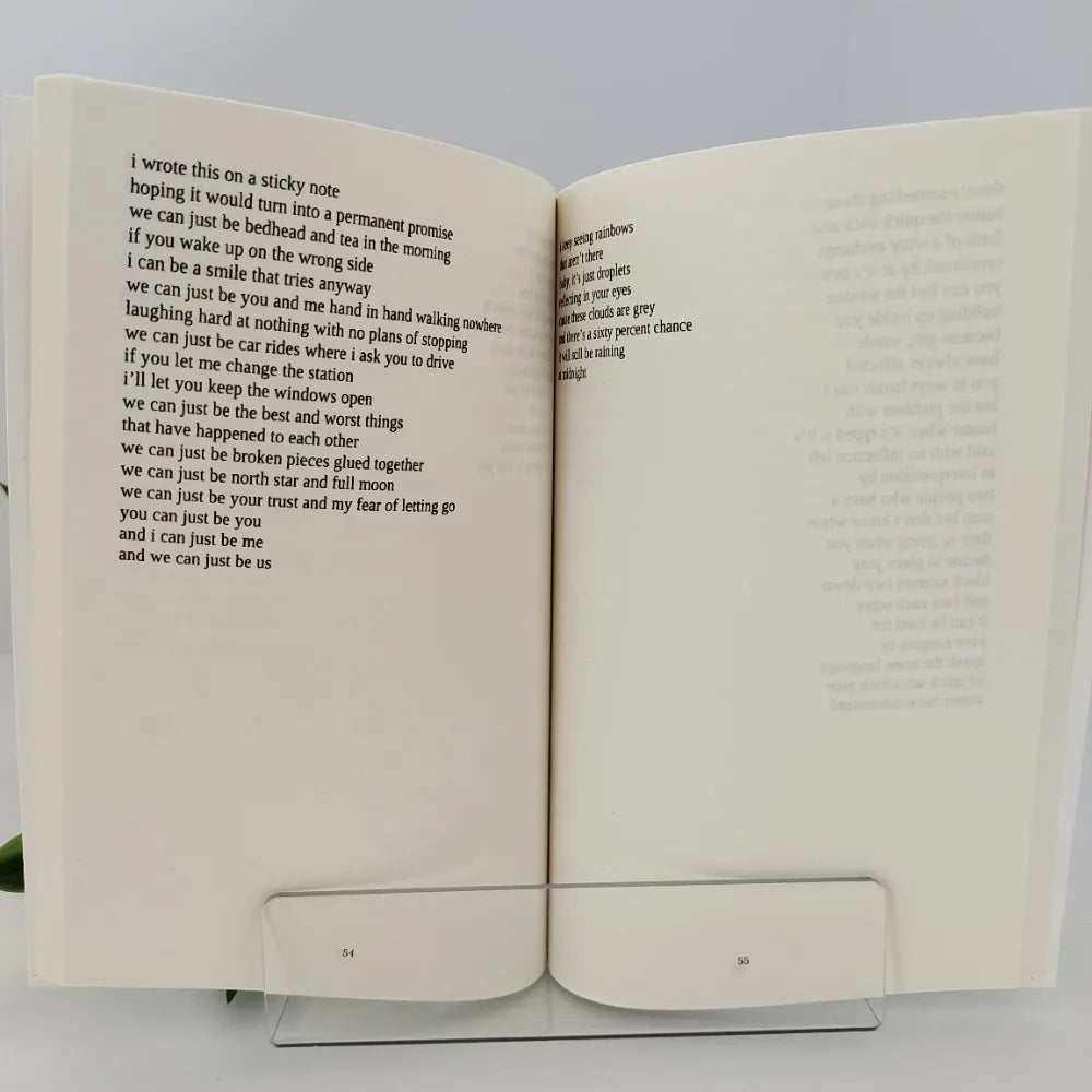 Open book with text on a white background